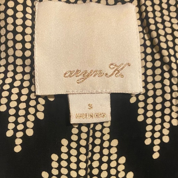 Stylish Sleeveless Mini Dress Small Embellished Neck
Peplum Design Side Pockets - Picture 12 of 12